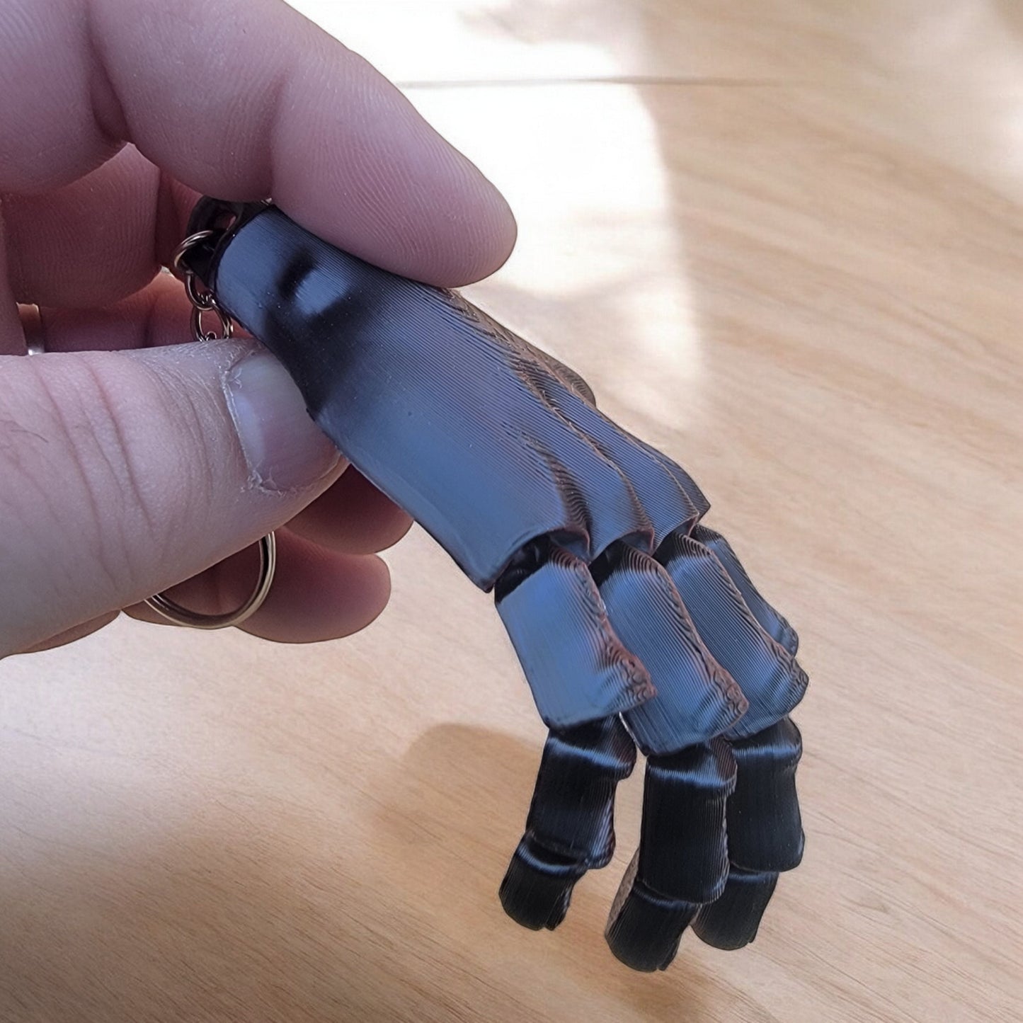 Articulated Flexi-hand Keychain